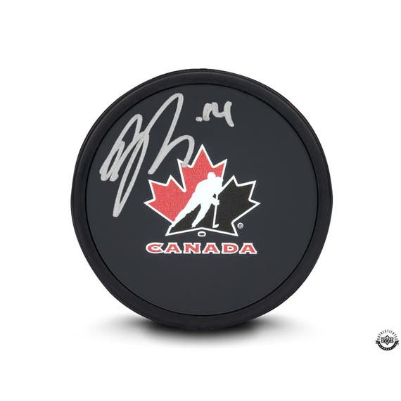 Nick Suzuki Autographed Black Team Canada Rubber Hockey Puck
