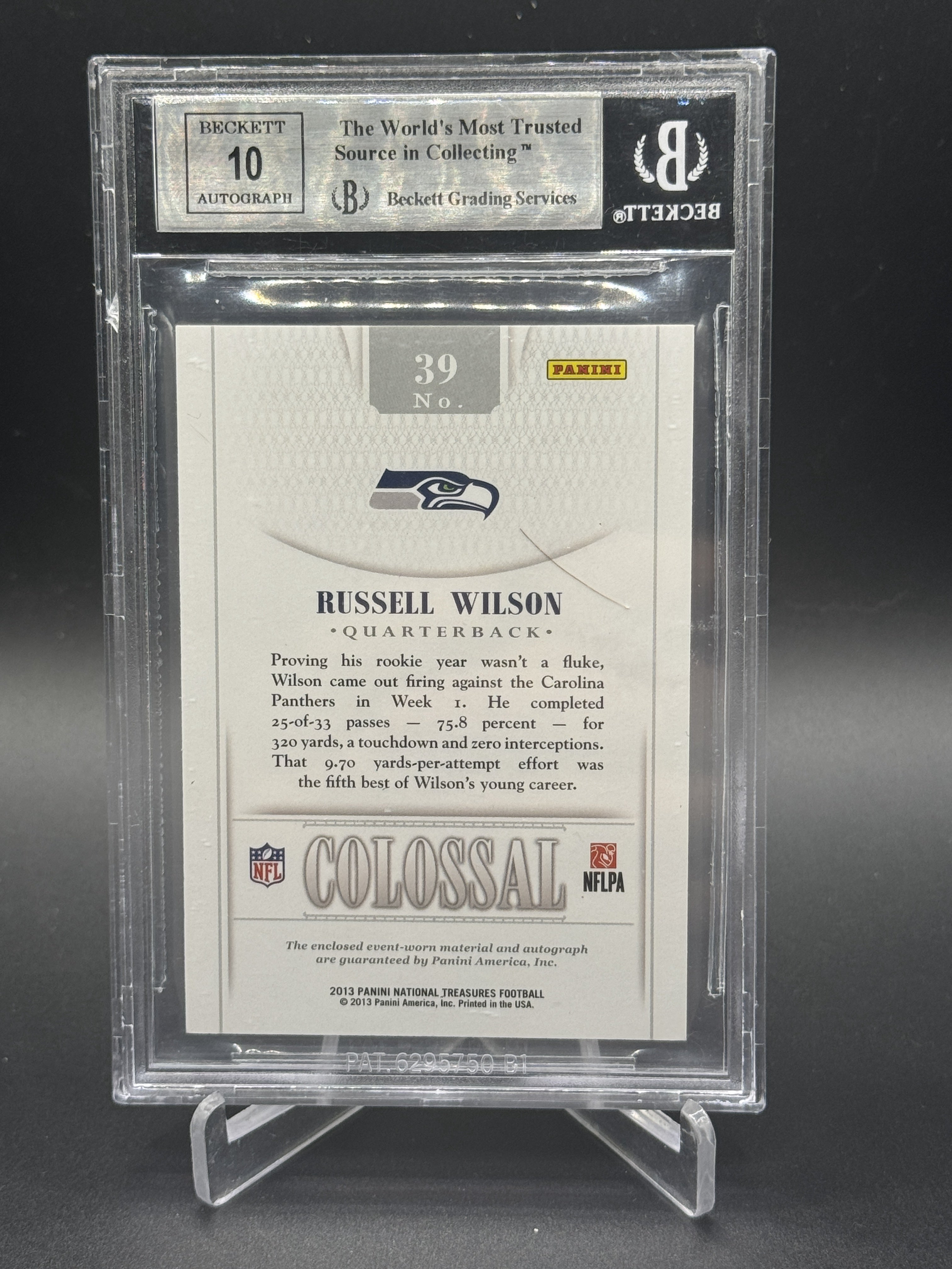 2013 National Treasures #39 Russell Wilson Colossal Jersey Number Auto /25 BGS 9