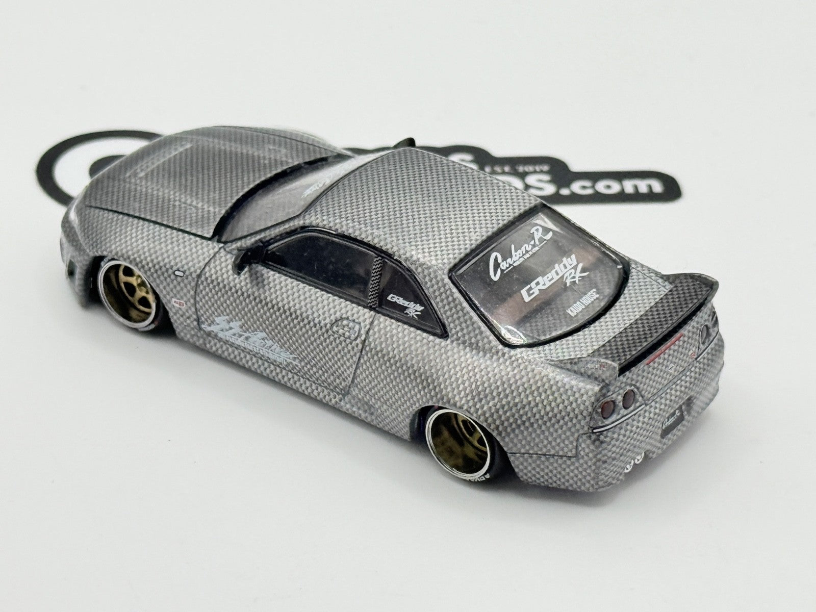 Kaido House x Mini GT KHMG116 Nissan Skyline GT-R (R33) Active Carbon R CHASE