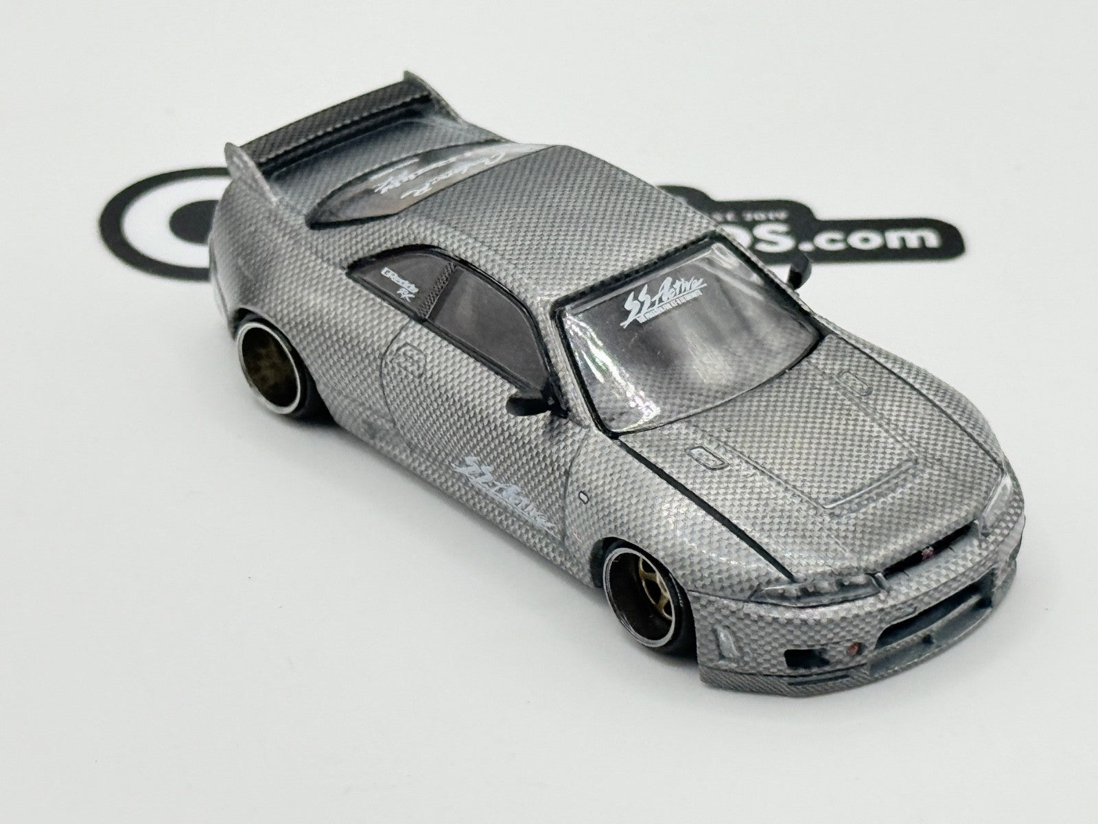 Kaido House x Mini GT KHMG116 Nissan Skyline GT-R (R33) Active Carbon R CHASE