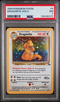 PSA 7 - 1999 POKEMON FOSSIL #4 DRAGONITE-HOLO